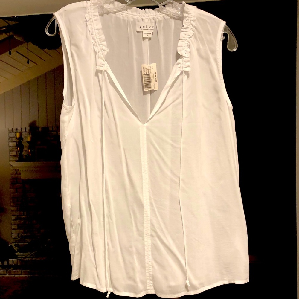 Sheer white sleeveless blouse